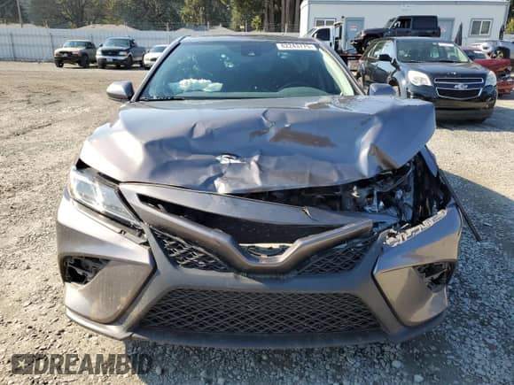 2019 Toyota Camry LE с VIN 4T1B11HK6KU735056, выставлен на аукционе Copart как лот 82243775 с пробегом 111 013 миль миль и Списание • Salvage title. История ставок и продаж доступна на DreamBid. Изображение 5.