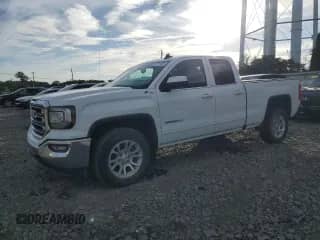 2018 GMC Sierra 1500 SLE z VIN 2GTV2MECXJ1110666, wystawiony jako Copart lot #81191405 z przebiegiem Nie podano mil oraz Czysty tytuł • Clean title. Historia ofert i sprzedaży dostępna na DreamBid. Obrazek 1.