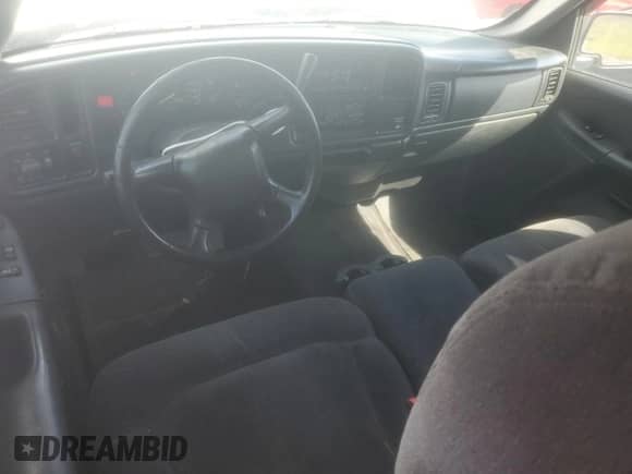 2001 Chevrolet Silverado 1500 LS с VIN 2GCEC19V711148590, выставлен на аукционе Copart как лот 84185575 с пробегом 209 680 миль миль и Списание • Salvage title. История ставок и продаж доступна на DreamBid. Изображение 8.