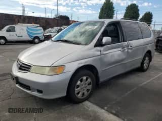 2002 Honda Odyssey EX с VIN 5FNRL18662B054002, выставлен на аукционе Copart как лот 86274695 с пробегом 210 011 миль миль и Списание • Salvage title. История ставок и продаж доступна на DreamBid. Изображение 1.