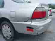 1996 Honda Accord LX with VIN 1HGCD563XTA152271, listed as a IAAI auction lot 42864789 with 268,002 mi miles and . Bid and sale history available at DreamBid. Image 16.