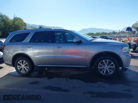2016 Dodge Durango Limited with VIN 1C4RDJDG9GC449162, listed as a IAAI auction lot 43293840 with 114,229 mi miles and . Bid and sale history available at DreamBid. Image 13.
