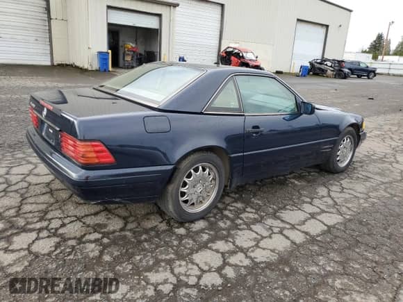 1997 Mercedes-Benz SL 500 с VIN WDBFA63F1VF150020, выставлен на аукционе Copart как лот 51012045 с пробегом 287 777 миль миль и Чистый • Clean title. История ставок и продаж доступна на DreamBid. Изображение 3.