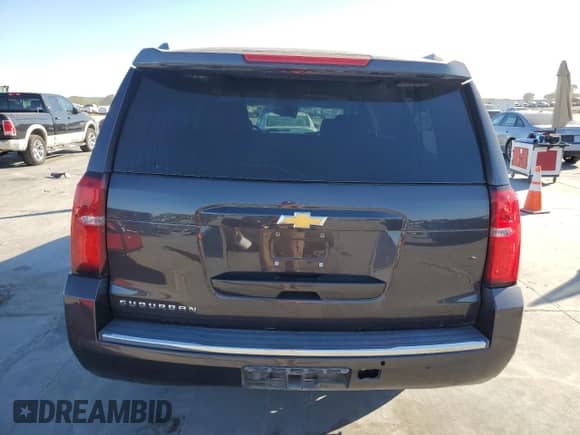 2016 Chevrolet Suburban LTZ with VIN 1GNSCJKC5GR170929, listed as a Copart auction lot 76271164 with Not provided miles and Salvage title. Bid and sale history available at DreamBid. Image 6.