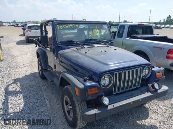 1997 Jeep Wrangler SE z VIN 1J4FY29P5VP426970, wystawiony jako IAAI lot #42595391 z przebiegiem 93 270 mil mil oraz . Historia ofert i sprzedaży dostępna na DreamBid. Obrazek 12.