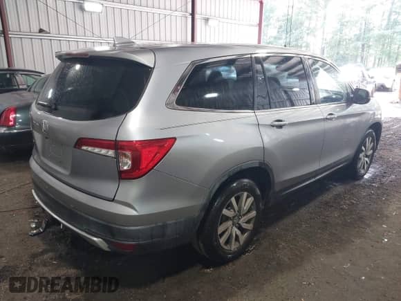 2019 Honda Pilot EX-L with VIN 5FNYF5H52KB034928, listed as a IAAI auction lot 42749183 with 82,661 mi miles and . Bid and sale history available at DreamBid. Image 4.