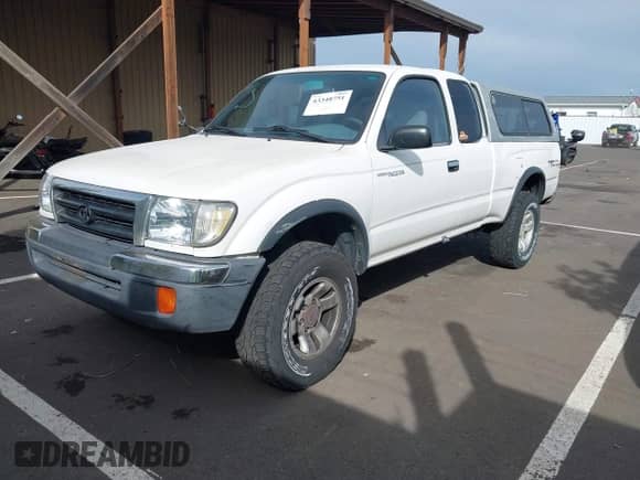 2000 Toyota Tacoma PreRunner z VIN 4TASN92N1YZ654211, wystawiony jako IAAI lot #43348751 z przebiegiem 278 908 mil mil oraz . Historia ofert i sprzedaży dostępna na DreamBid. Obrazek 2.