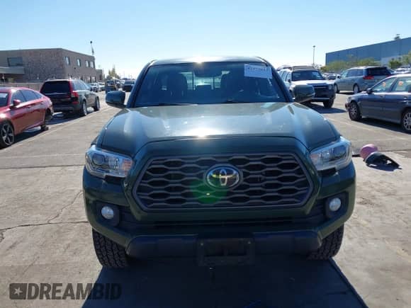 2021 Toyota Tacoma SR5 z VIN 3TMDZ5BN8MM114649, wystawiony jako IAAI lot #43493615 z przebiegiem 63 288 mil mil oraz . Historia ofert i sprzedaży dostępna na DreamBid. Obrazek 13.