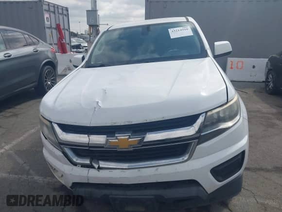 2018 Chevrolet Colorado 4WD Work Truck z VIN 1GCHTBEA8J1254896, wystawiony jako IAAI lot #43214910 z przebiegiem 164 056 mil mil oraz . Historia ofert i sprzedaży dostępna na DreamBid. Obrazek 13.