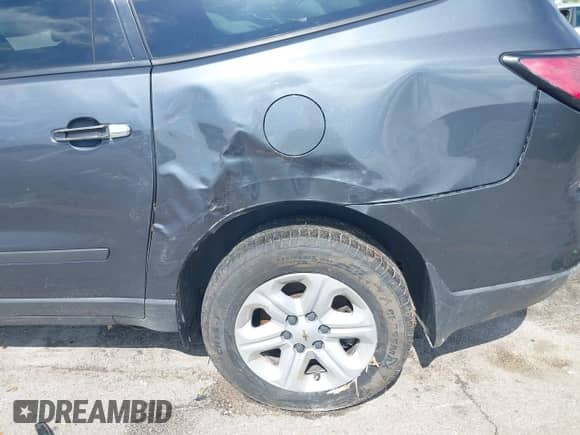 2014 Chevrolet Traverse LS z VIN 1GNKVFED8EJ309426, wystawiony jako IAAI lot #42571126 z przebiegiem 225 400 mil mil oraz . Historia ofert i sprzedaży dostępna na DreamBid. Obrazek 6.