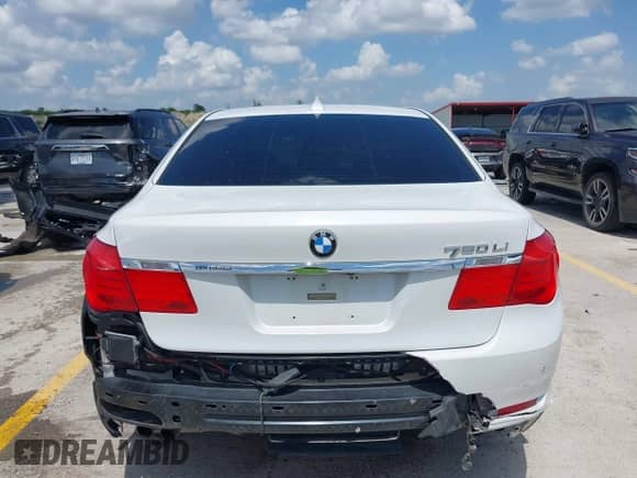 2012 BMW 7 Series 750Li z VIN WBAKB8C54CC964576, wystawiony jako IAAI lot #42499443 z przebiegiem 78 728 mil mil oraz . Historia ofert i sprzedaży dostępna na DreamBid. Obrazek 17.