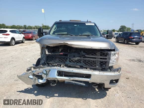 2013 Chevrolet Silverado 3500HD LTZ с VIN 1GC4K1C8XDF158156, выставлен на аукционе Copart как лот 66714274 с пробегом 297 342 миль миль и Списание • Salvage title. История ставок и продаж доступна на DreamBid. Изображение 5.