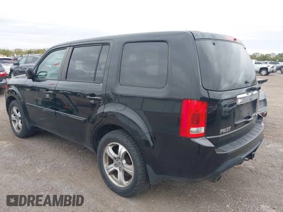 2013 Honda Pilot EX-L with VIN 5FNYF4H58DB081104, listed as a IAAI auction lot 43435936 with 193,083 mi miles and . Bid and sale history available at DreamBid. Image 3.