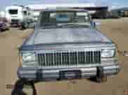 1991 Jeep Grand Cherokee with VIN 1J4FJ58S4ML592642, listed as a Copart auction lot 69472814 with 153,328 mi miles and Clean title. Bid and sale history available at DreamBid. Image 5.