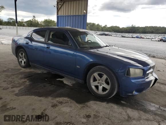 2009 Dodge Charger SXT с VIN 2B3KA33V79H514212, выставлен на аукционе Copart как лот 73103164 с пробегом 211 375 миль миль и Списание • Salvage title. История ставок и продаж доступна на DreamBid. Изображение 4.