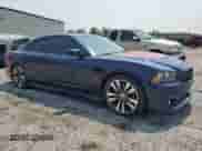 2013 Dodge Charger SRT-8 z VIN 2C3CDXEJ8DH675600, wystawiony jako Copart lot #59150215 z przebiegiem 71 231 mil mil oraz Szkoda całkowita • Salvage title. Historia ofert i sprzedaży dostępna na DreamBid. Obrazek 4.