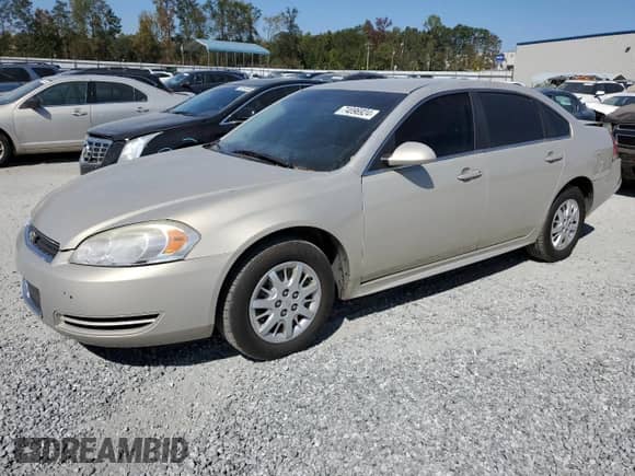 2010 Chevrolet Impala Police Police with VIN 2G1WD5EM8A1233498, listed as a Copart auction lot 74896924 with 143,852 mi miles and Salvage title. Bid and sale history available at DreamBid. Image 1.