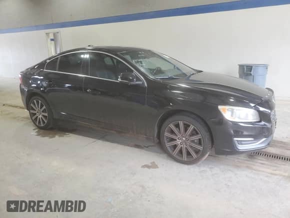 2015 Volvo S60 T6 Drive-E with VIN YV149MFK2F2351331, listed as a Copart auction lot 69287175 with 126,628 mi miles and Salvage title. Bid and sale history available at DreamBid. Image 4.
