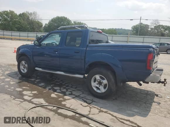 2001 Nissan Frontier SE with VIN 1N6ED27T41C347012, listed as a Copart auction lot 59388375 with 284,480 mi miles and Salvage title. Bid and sale history available at DreamBid. Image 2.