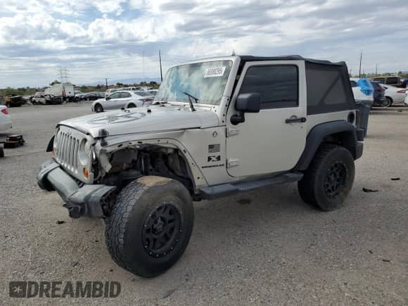 2007 Jeep Wrangler X с VIN 1J4FA24147L157152, выставлен на аукционе Copart как лот 86988295 с пробегом 144 521 миль миль и Списание • Salvage title. История ставок и продаж доступна на DreamBid. Изображение 1.