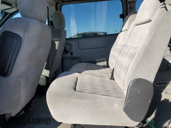 2004 Chevrolet Venture LS с VIN 1GNDX03E24D235851, выставлен на аукционе Copart как лот 44553395 с пробегом 228 561 миль миль и Списание • Salvage title. История ставок и продаж доступна на DreamBid. Изображение 11.