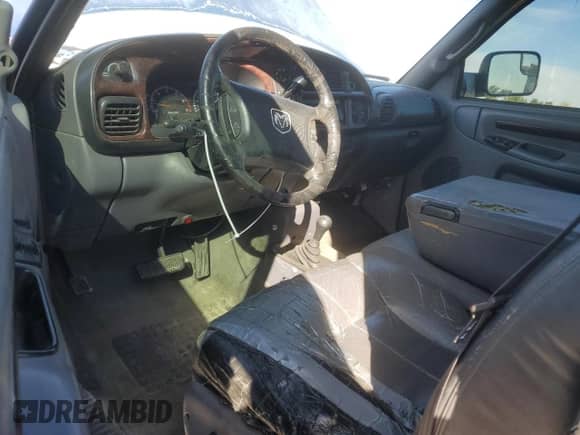 1998 Dodge 1500 z VIN 3B7HF12Z7WG108042, wystawiony jako Copart lot #74530764 z przebiegiem 249 992 mil mil oraz Czysty tytuł • Clean title. Historia ofert i sprzedaży dostępna na DreamBid. Obrazek 8.