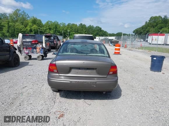 2001 Saturn SL with VIN 1G8ZF52851Z238231, listed as a IAAI auction lot 42454503 with 144,748 mi miles and . Bid and sale history available at DreamBid. Image 17.
