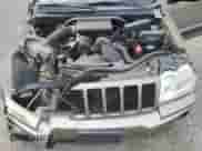 2006 Jeep Grand Cherokee Laredo z VIN 1J4GR48K66C109369, wystawiony jako Copart lot #70893895 z przebiegiem 158 057 mil mil oraz Szkoda całkowita • Salvage title. Historia ofert i sprzedaży dostępna na DreamBid. Obrazek 12.