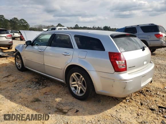 2006 Dodge Magnum with VIN 2D4FV47V76H124195, listed as a Copart auction lot 48734725 with 196,437 mi miles and Salvage title. Bid and sale history available at DreamBid. Image 2.