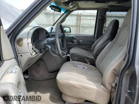 1999 Chevrolet Astro z VIN 1GNDM19WXXB114838, wystawiony jako Copart lot #55070715 z przebiegiem Nie podano mil oraz Szkoda całkowita • Salvage title. Historia ofert i sprzedaży dostępna na DreamBid. Obrazek 7.
