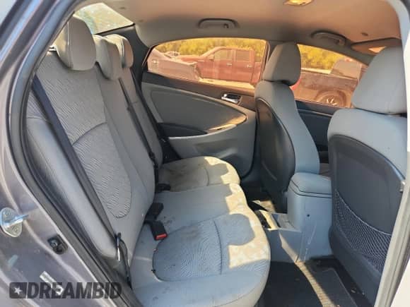 2014 Hyundai Accent GLS z VIN KMHCU4AE8EU624837, wystawiony jako Copart lot #85711535 z przebiegiem 127 432 mil mil oraz Szkoda całkowita • Salvage title. Historia ofert i sprzedaży dostępna na DreamBid. Obrazek 10.