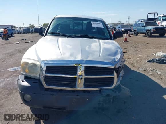 2005 Dodge Dakota SLT with VIN 1D7HW42NX5S134596, listed as a IAAI auction lot 43314356 with 129,087 mi miles and . Bid and sale history available at DreamBid. Image 13.