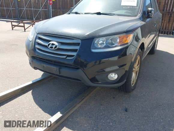 2012 Hyundai Santa Fe SE with VIN 5XYZHDAG8CG167966, listed as a IAAI auction lot 42901636 with 113,334 mi miles and . Bid and sale history available at DreamBid. Image 6.