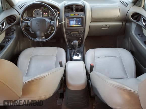 2005 Hyundai Santa Fe GLS z VIN KM8SC13E25U941748, wystawiony jako Copart lot #79509904 z przebiegiem 135 000 mil mil oraz Szkoda całkowita • Salvage title. Historia ofert i sprzedaży dostępna na DreamBid. Obrazek 8.