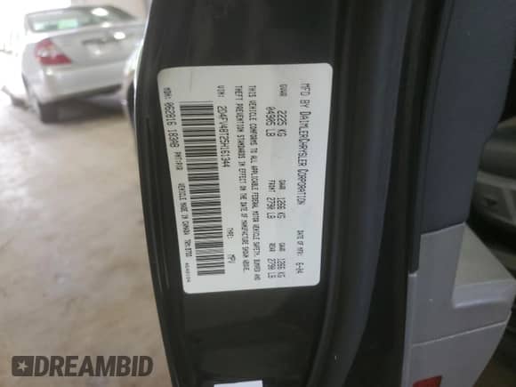 2005 Dodge Magnum SE with VIN 2D4FV48T25H161344, listed as a Copart auction lot 68303715 with 95,064 mi miles and Salvage title. Bid and sale history available at DreamBid. Image 13.