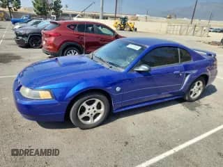 2004 Ford Mustang Standard с VIN 1FAFP40604F212780, выставлен на аукционе Copart как лот 85723555 с пробегом 222 373 миль миль и Чистый • Clean title. История ставок и продаж доступна на DreamBid. Изображение 1.
