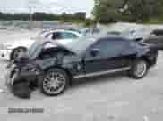 2014 Ford Mustang V6 with VIN 1ZVBP8AM4E5251065, listed as a Copart auction lot 82060415 with 105,637 mi miles and Salvage title. Bid and sale history available at DreamBid. Image 1.