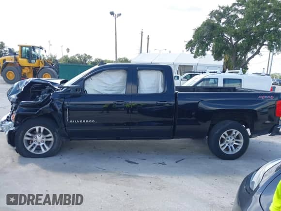 2017 Chevrolet Silverado 1500 LT z VIN 1GCVKRECXHZ401134, wystawiony jako IAAI lot #42974829 z przebiegiem 107 239 mil mil oraz . Historia ofert i sprzedaży dostępna na DreamBid. Obrazek 14.