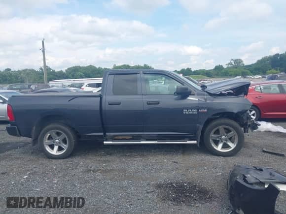 2016 Ram 1500 ST with VIN 1C6RR7FT9GS310726, listed as a IAAI auction lot 42730574 with 117,537 mi miles and . Bid and sale history available at DreamBid. Image 14.