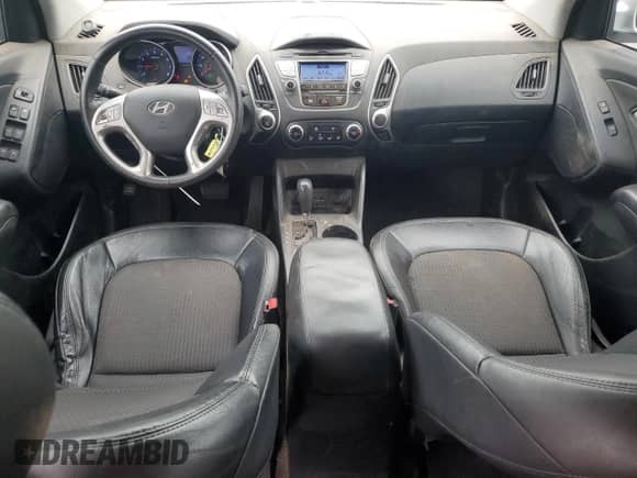 2012 Hyundai Tucson GLS with VIN KM8JU3AC2CU489478, listed as a Copart auction lot 71709285 with 121,070 mi miles and Salvage title. Bid and sale history available at DreamBid. Image 8.