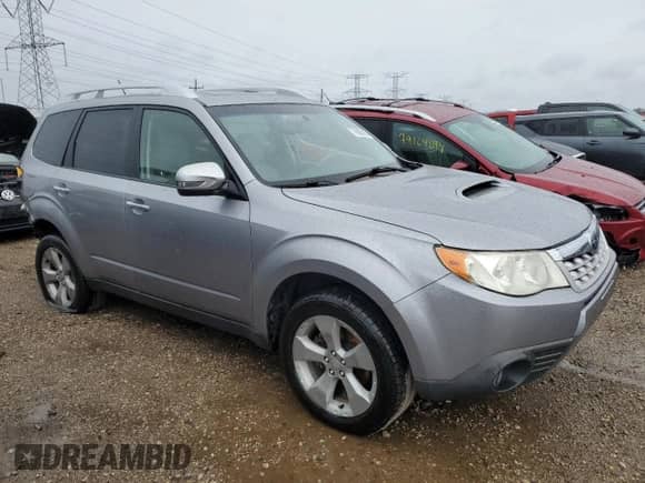 2011 Subaru Forester XT Touring with VIN JF2SHGGC8BH741416, listed as a Copart auction lot 78990184 with 82,789 mi miles and Salvage title. Bid and sale history available at DreamBid. Image 4.