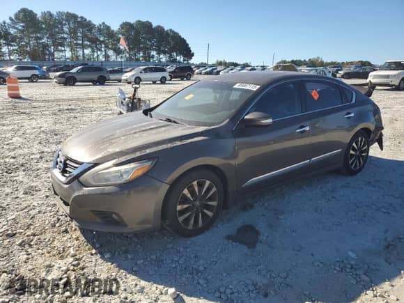 2016 Nissan Altima SR with VIN 1N4AL3AP0GC117651, listed as a Copart auction lot 86687115 with 164,256 mi miles and Salvage title. Bid and sale history available at DreamBid. Image 1.