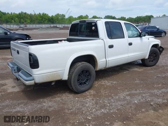 2002 Dodge Dakota with VIN 1B7HL38ZX2S625110, listed as a IAAI auction lot 42511915 with 262,217 mi miles and . Bid and sale history available at DreamBid. Image 4.