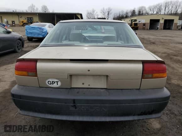 1994 Saturn SL with VIN 1G8ZH5593RZ290970, listed as a Copart auction lot 48029235 with 116,730 mi miles and Salvage title. Bid and sale history available at DreamBid. Image 6.