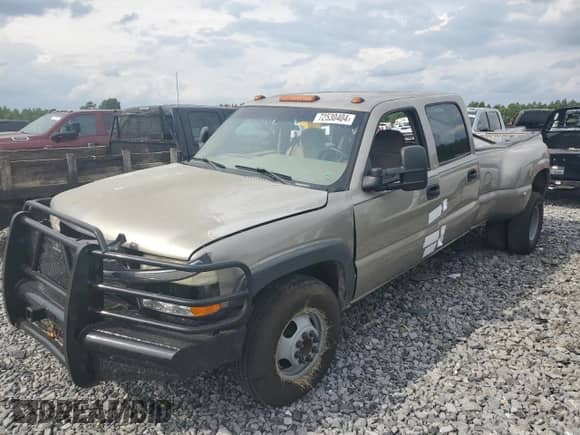 2001 Chevrolet Silverado 3500 LS с VIN 1GCJC33121F182199, выставлен на аукционе Copart как лот 72530404 с пробегом 252 199 миль миль и Списание • Salvage title. История ставок и продаж доступна на DreamBid. Изображение 1.