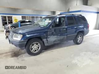 2003 Jeep Grand Cherokee Laredo z VIN 1J4GX48S13C543068, wystawiony jako Copart lot #86249205 z przebiegiem 200 531 mil mil oraz Czysty tytuł • Clean title. Historia ofert i sprzedaży dostępna na DreamBid. Obrazek 1.