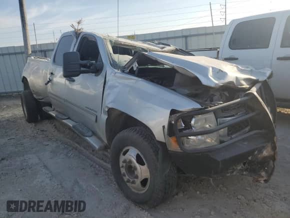 2012 Chevrolet Silverado 3500HD LT с VIN 1GC4K0C89CF219697, выставлен на аукционе Copart как лот 72002704 с пробегом Не указан миль и Списание • Salvage title. История ставок и продаж доступна на DreamBid. Изображение 4.