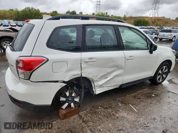2018 Subaru Forester with VIN JF2SJABC5JH415175, listed as a Copart auction lot 71527095 with 102,783 mi miles and Salvage title. Bid and sale history available at DreamBid. Image 3.