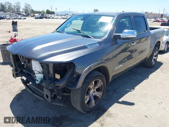 2019 Ram 1500 Laramie with VIN 1C6RREJT3KN894303, listed as a IAAI auction lot 42642439 with 84,379 mi miles and . Bid and sale history available at DreamBid. Image 2.
