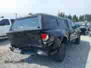 2018 Toyota Tacoma SR5 z VIN 5TFSZ5AN2JX151257, wystawiony jako IAAI lot #42895721 z przebiegiem 157 990 mil mil oraz . Historia ofert i sprzedaży dostępna na DreamBid. Obrazek 6.